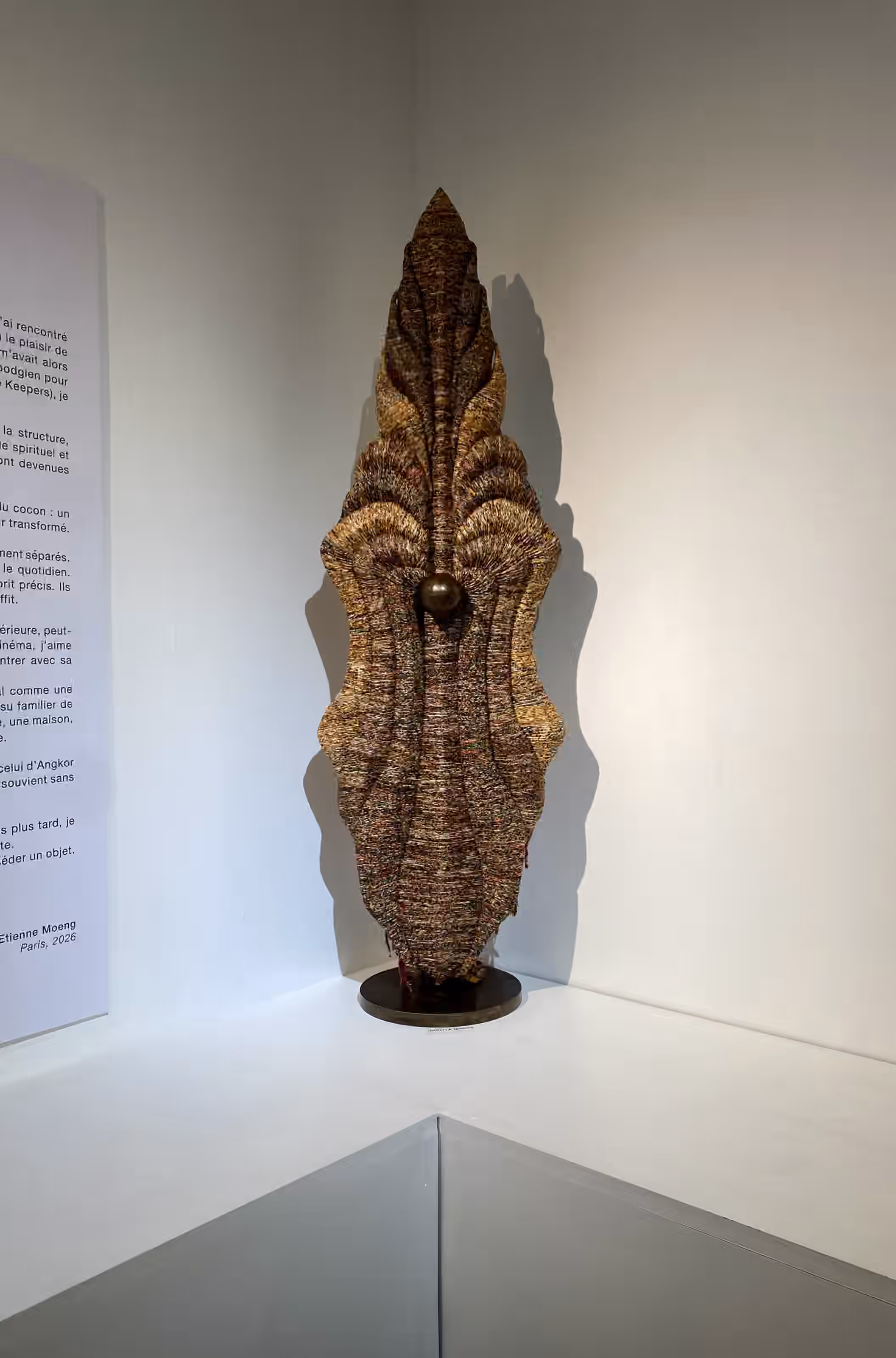 Sothea Thang sarong sculpture with its central sphere, on show at Galerie Lee in Paris